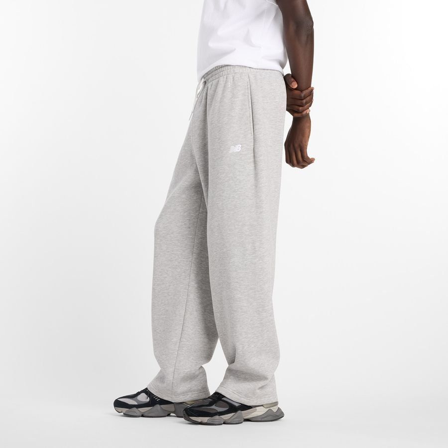 New Balance miesten collegehousut Sport Essentials Fleece Pant, vaaleanharmaa