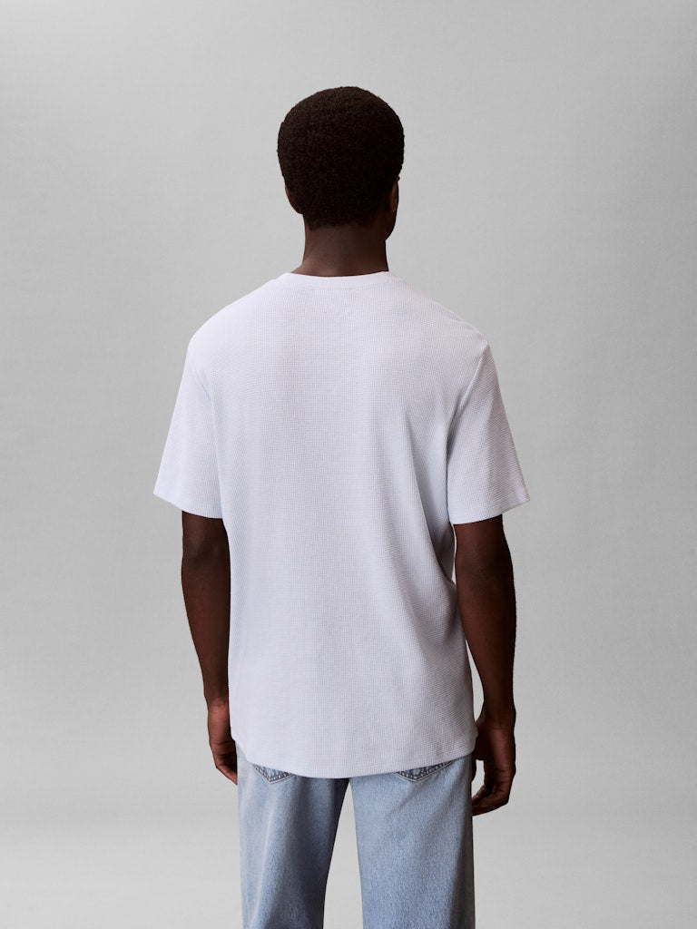 Calvin Klein Jeans miesten t-paita SS Waffle Badge Crewnk Tee, vaaleansininen