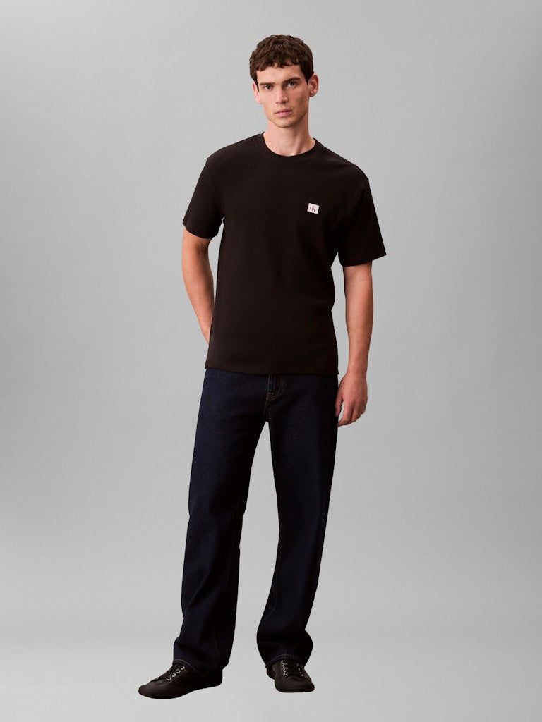 Calvin Klein Jeans miesten t-paita SS Waffle Badge Crewnk Tee, musta