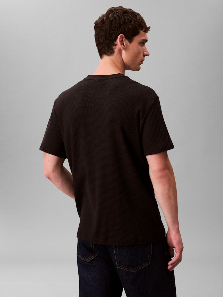 Calvin Klein Jeans miesten t-paita SS Waffle Badge Crewnk Tee, musta