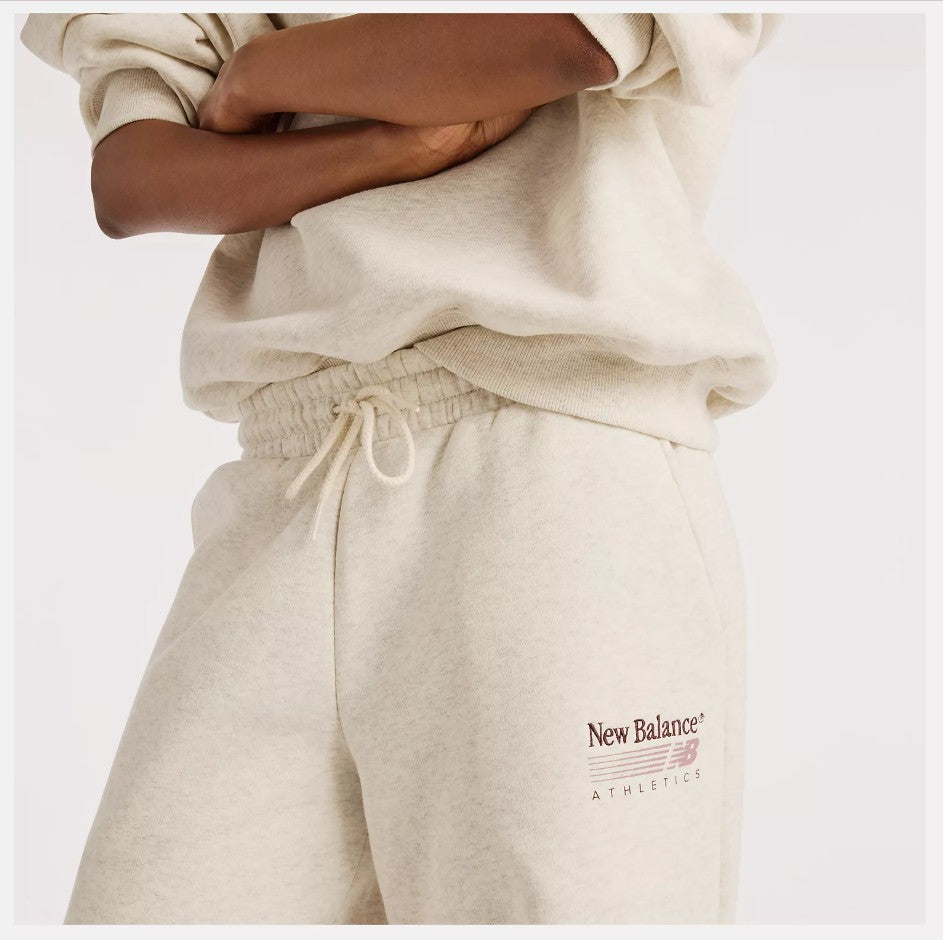 New Balance naisten collegehousut Trackside Fleece Pant, Beige