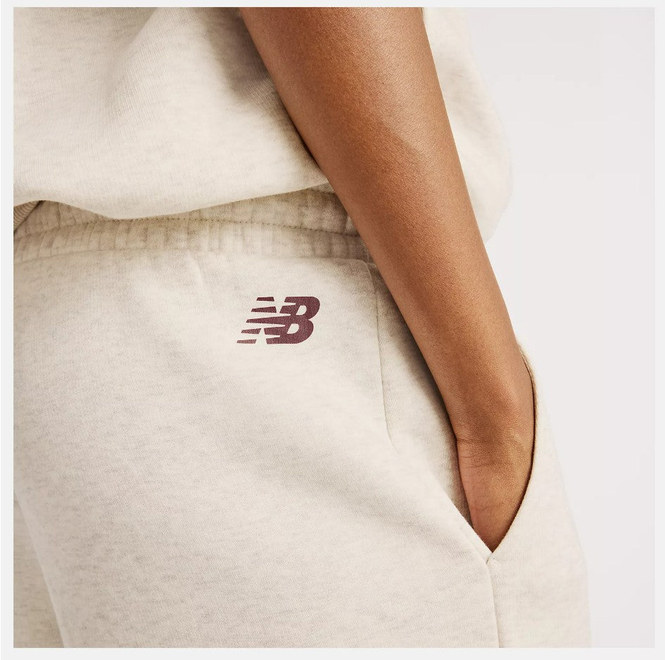 New Balance naisten collegehousut Trackside Fleece Pant, Beige