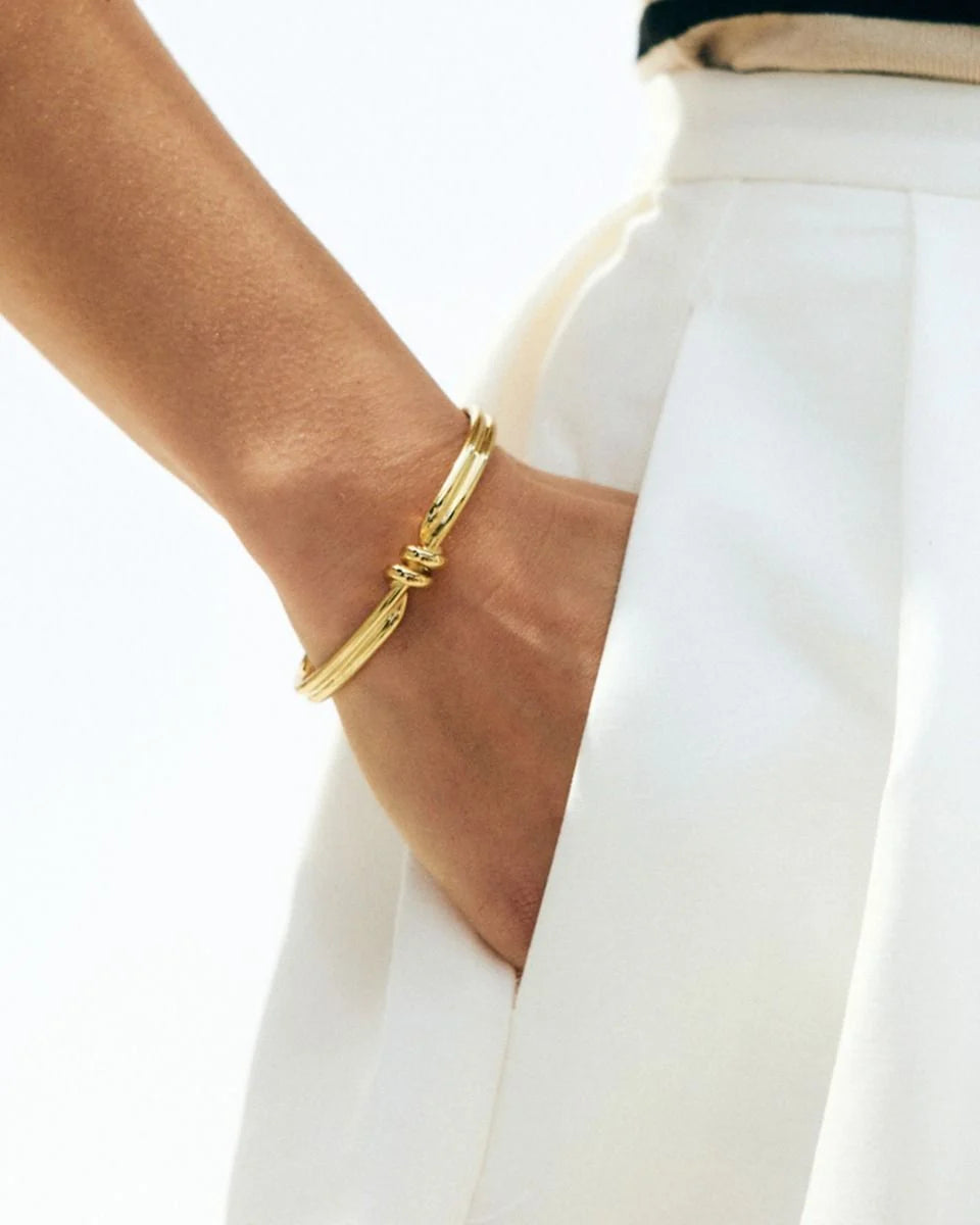 Edblad rannekoru Swivel Bangle, Gold pleated