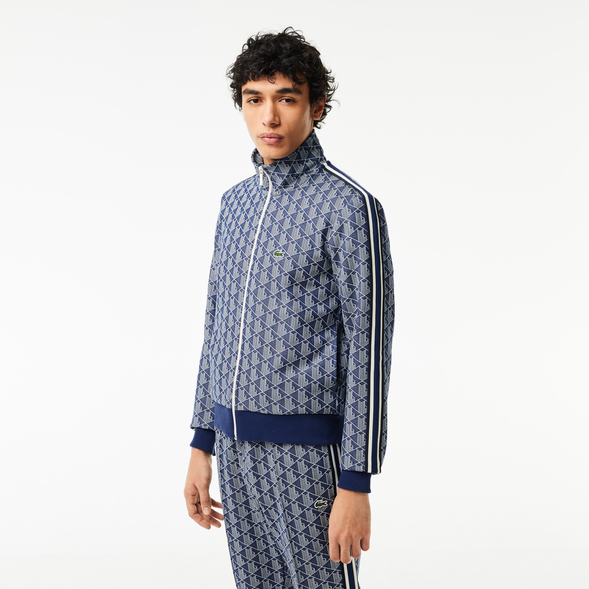 lacoste-miesten-verryttelytakki-paris-jacquard-monogram-zipped-sininen-kuosi-1