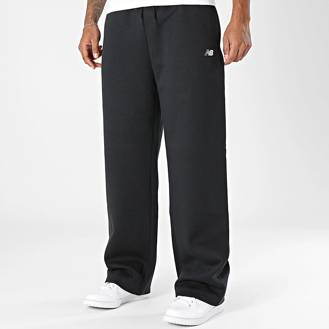 New Balance miesten collegehousut Sport Essentials Fleece Pant, musta