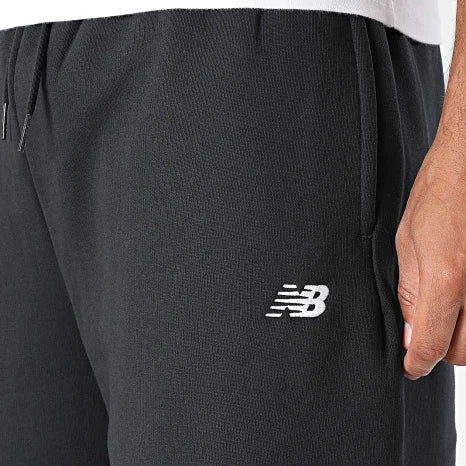 New Balance miesten collegehousut Sport Essentials Fleece Pant, musta