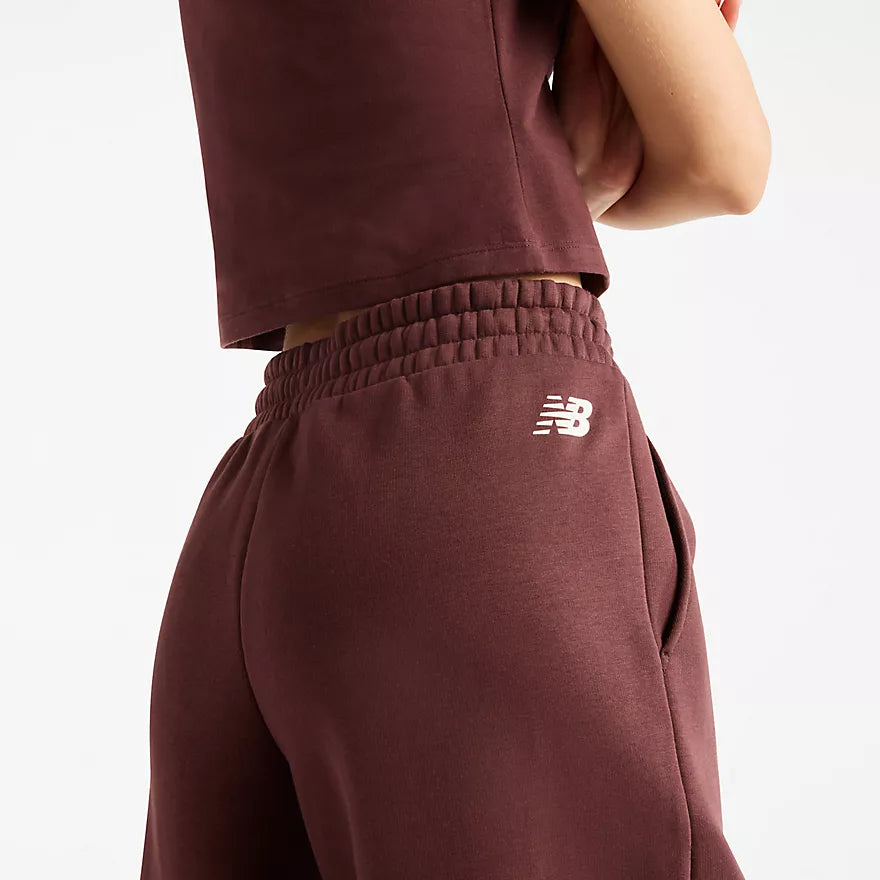 New Balance naisten collegehousut Trackside Fleece Pant, Cherry Leather