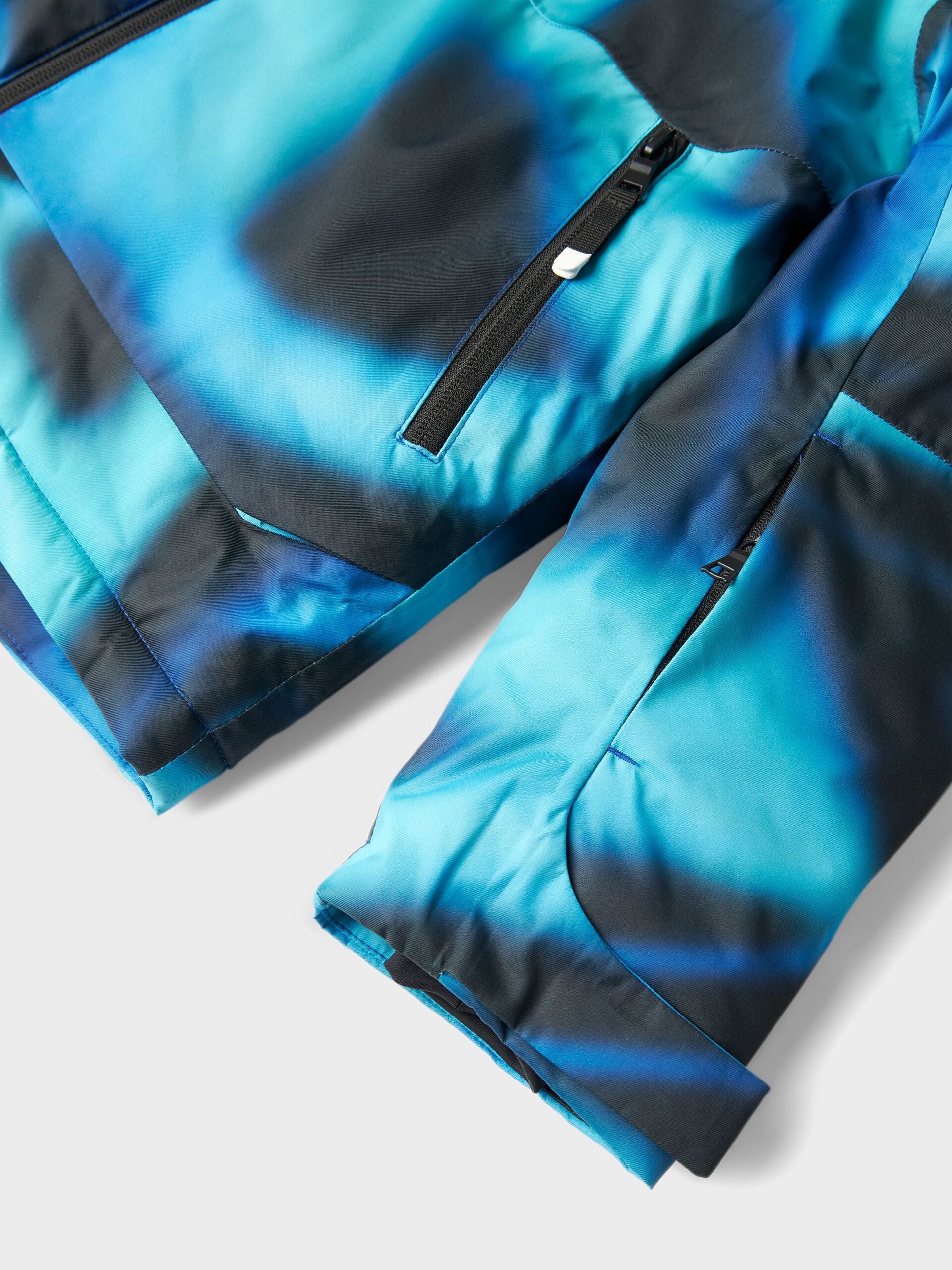 NKNSLOPE10 SKI JACKET TUMMANSININEN