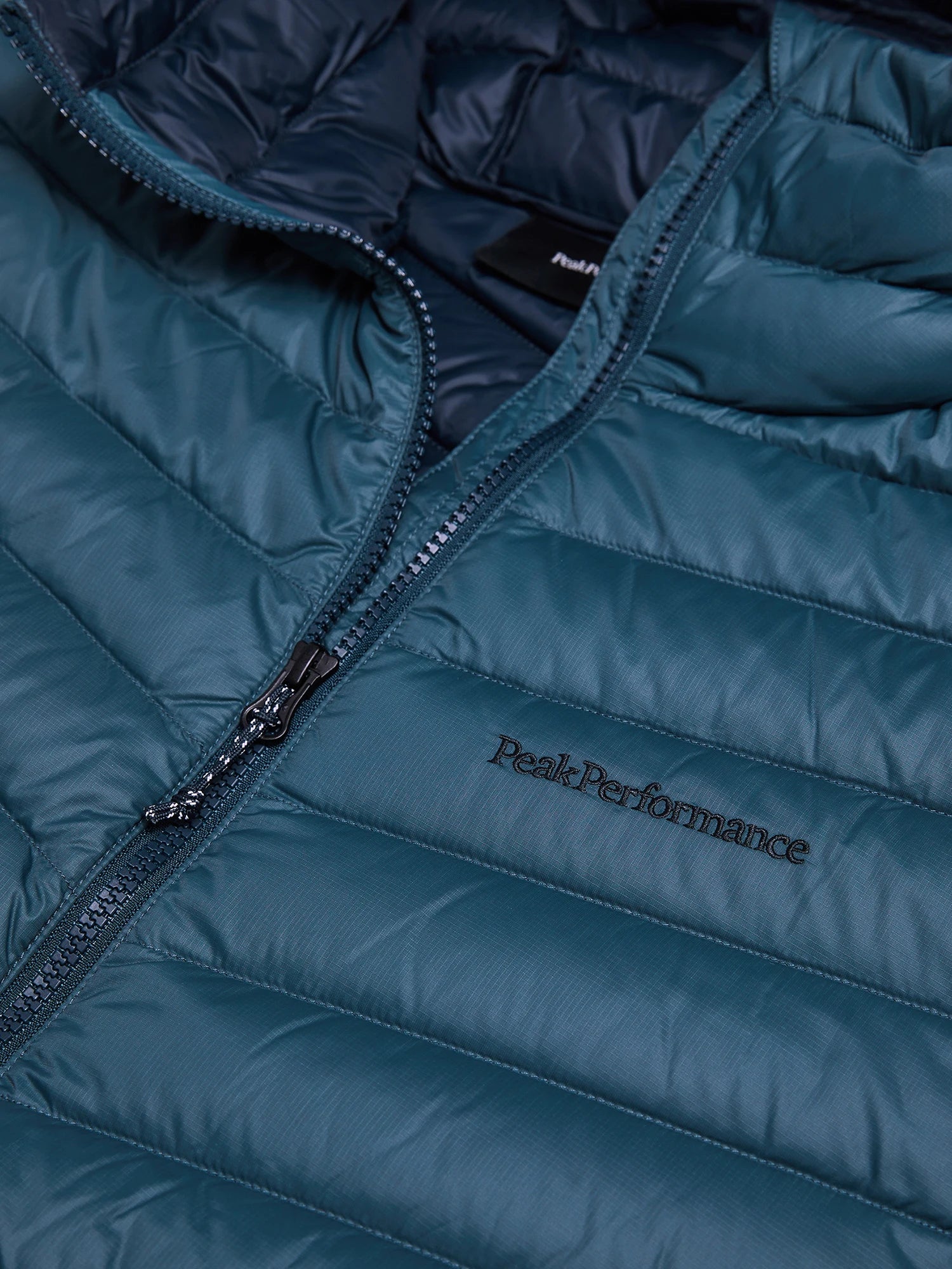 K M FROST DOWN HOOD JACKET PETROOLINSININEN