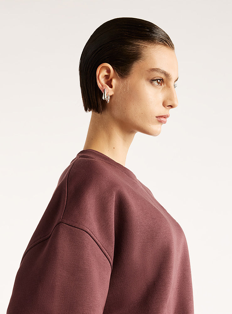 New Balance naisten collegepaita Trackside Fleece Crew, viininpunainen