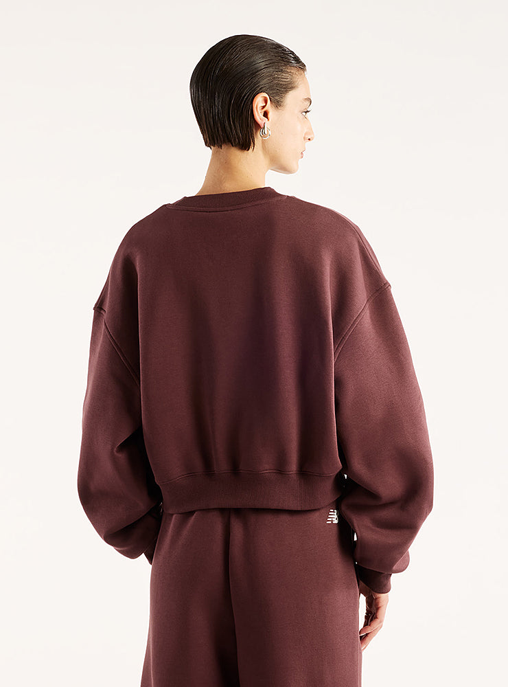 New Balance naisten collegepaita Trackside Fleece Crew, viininpunainen