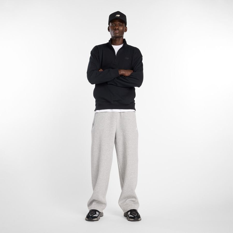 New Balance miesten collegehousut Sport Essentials Fleece Pant, vaaleanharmaa