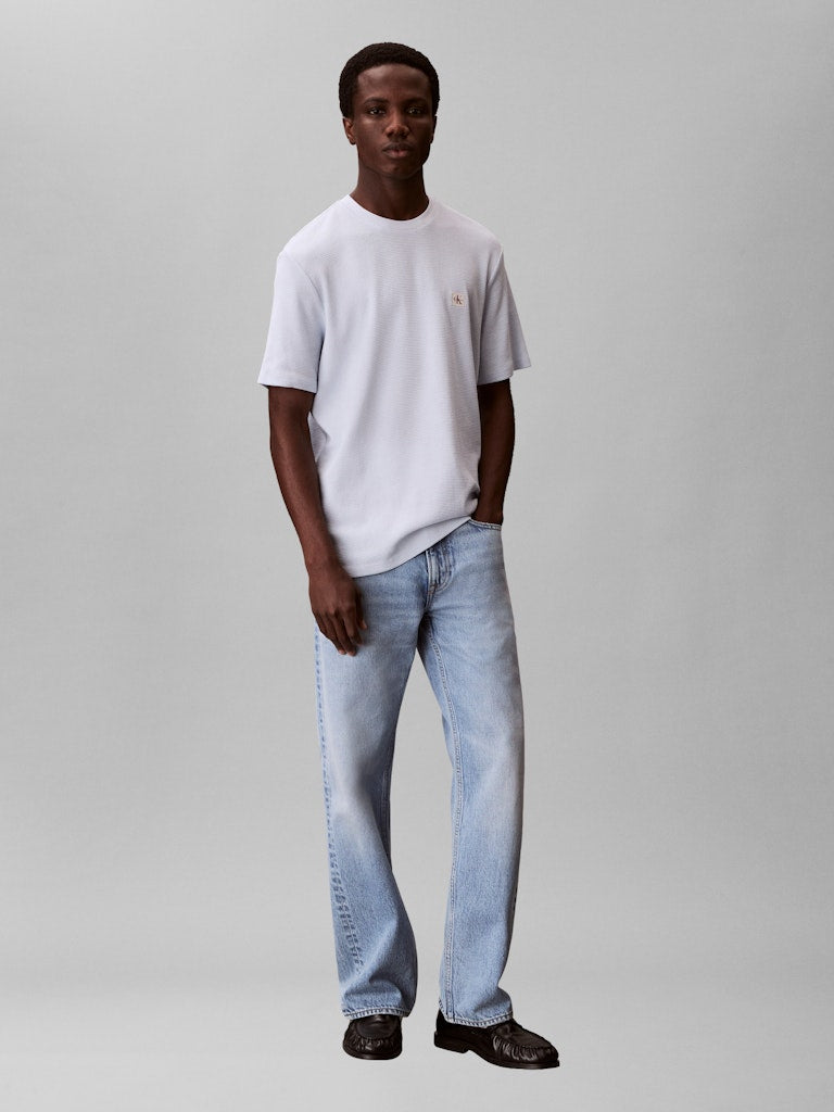 Calvin Klein Jeans miesten t-paita SS Waffle Badge Crewnk Tee, vaaleansininen