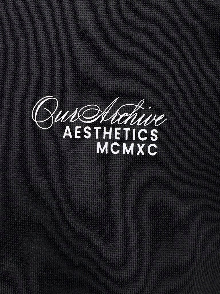 Jack and Jones Junior lasten huppari JJROAR SWEAT HOOD JNR, musta