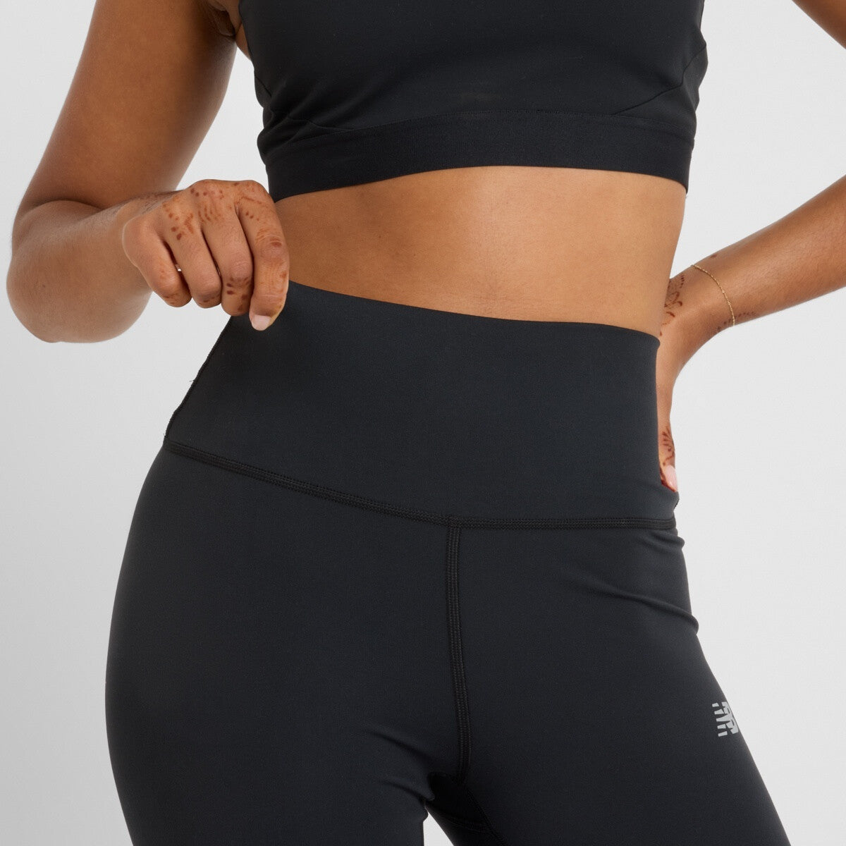 New Balance naisten leggingsit Harmony High Rise Legging 25", musta