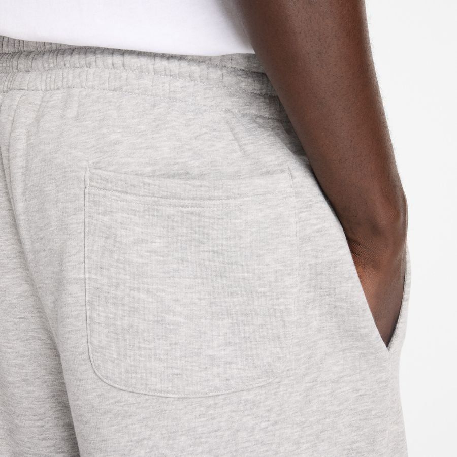 New Balance miesten collegehousut Sport Essentials Fleece Pant, vaaleanharmaa