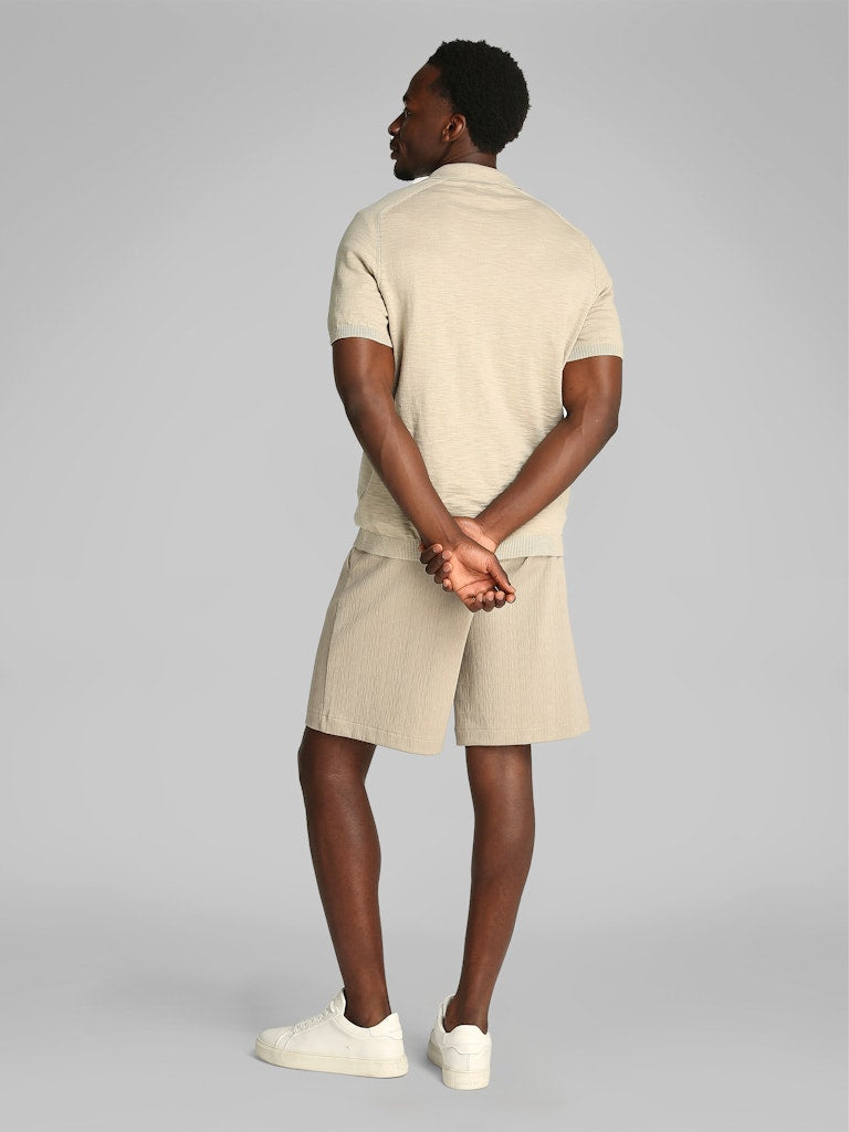 calvin-klein-jeans-miesten-pikeepaita-knitted-slub-texture-polo-beige-2