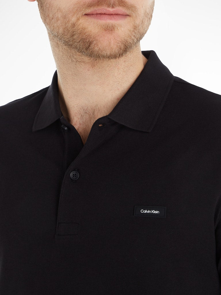 calvin-klein-jeans-miesten-pikeepaita-strech-pique-slim-button-polo-musta-3