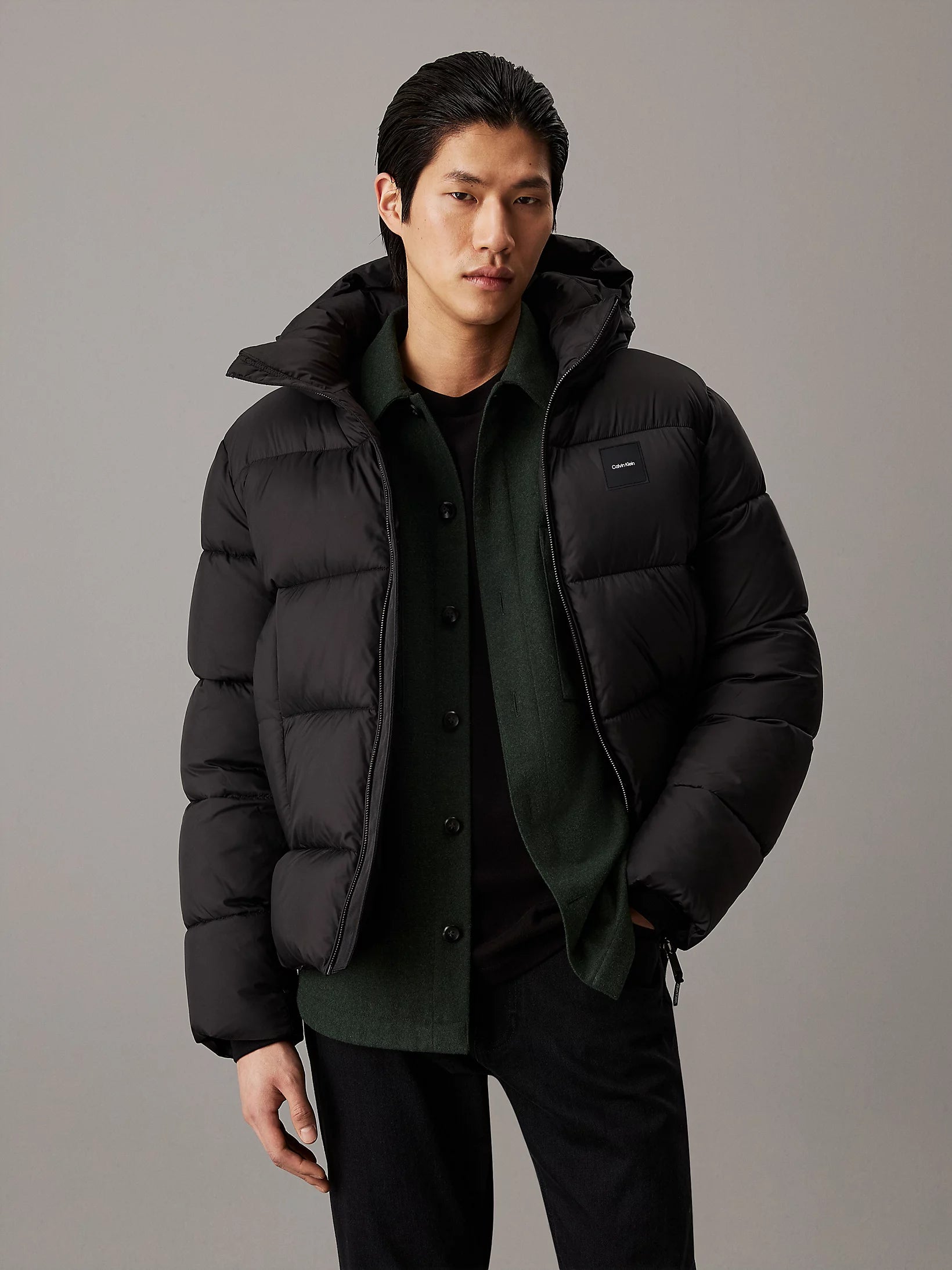 calvin-klein-jeans-miesten-takki-hooded-quilt-puffer-musta-1