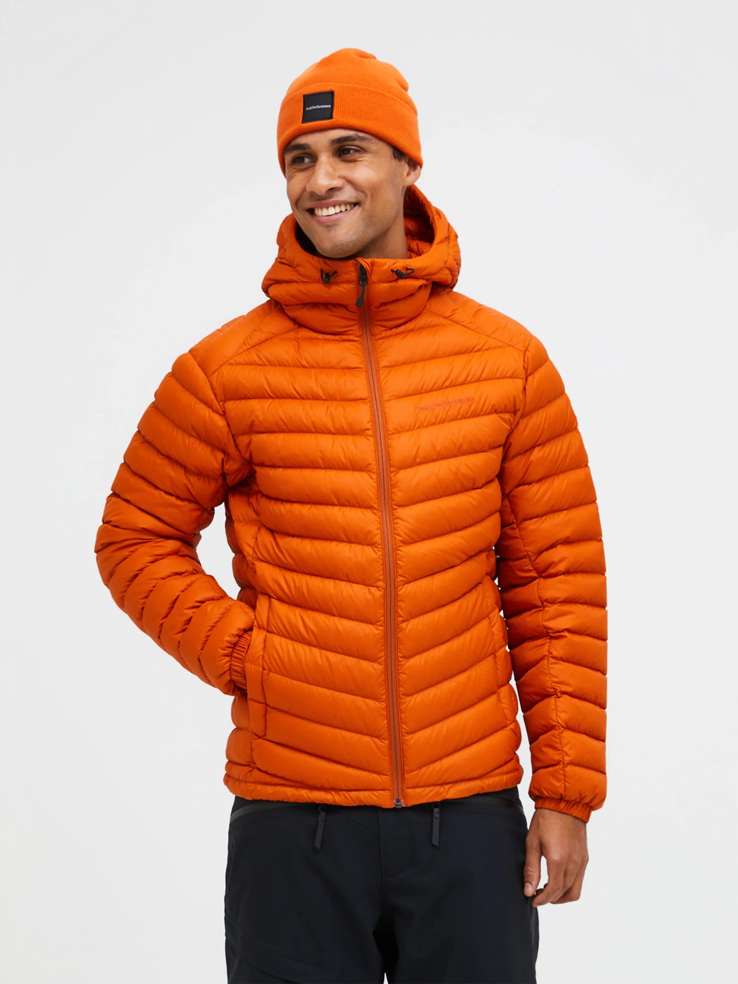 peak-performance-miesten-untuvatakki-frost-down-hood-jacket-oranssi-1