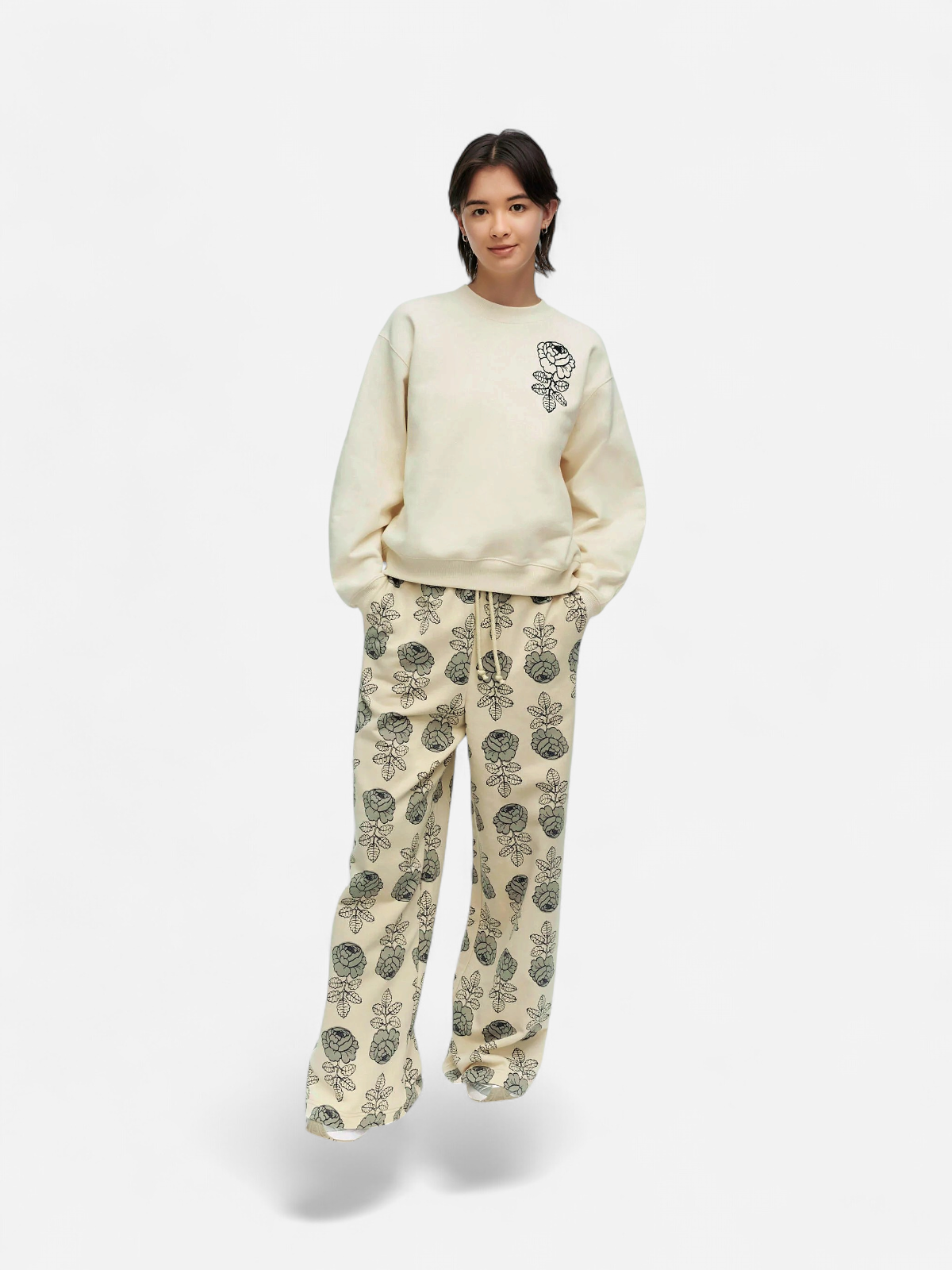 Marimekko collegehousut PUUSKA VIHKIRUUSU KISOKI, kuosillinen beige - Kekäle.fi