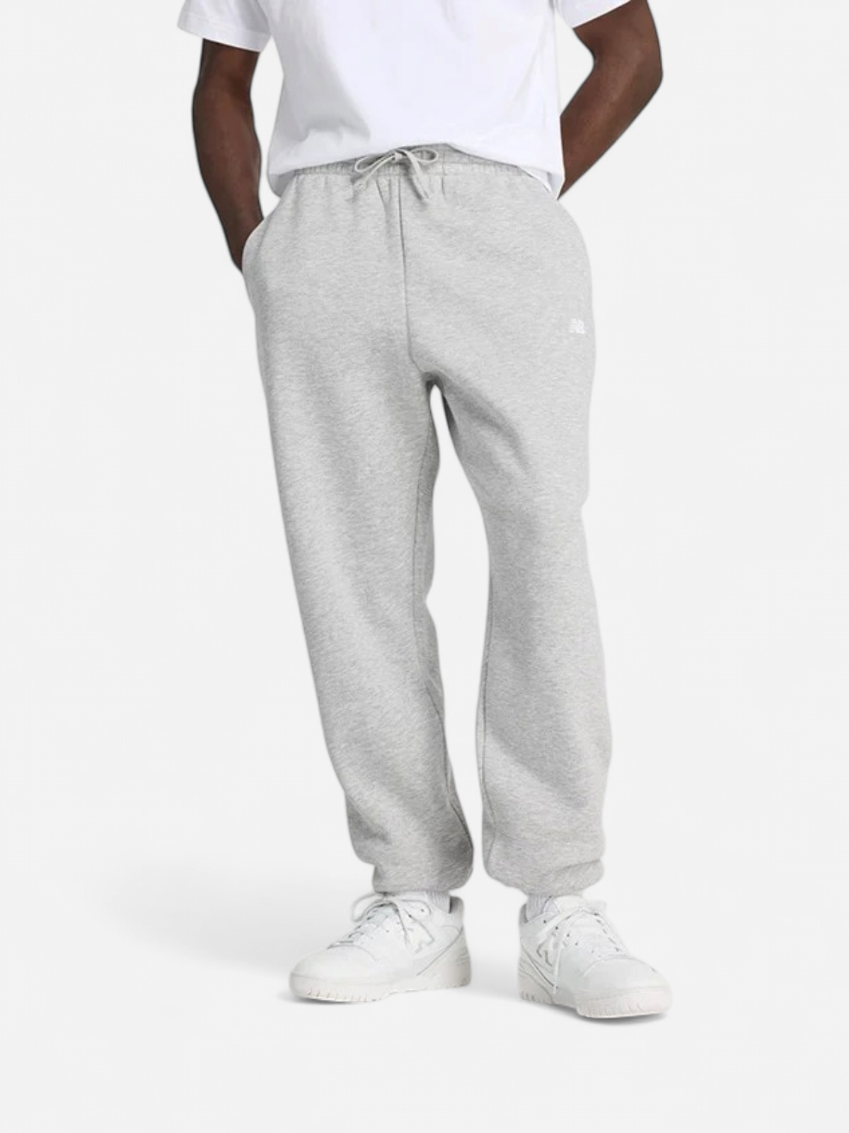 New Balance miesten collegehousut Sport Essentials Fleece Jogger Pants, vaaleanharmaa - Kekäle.fi