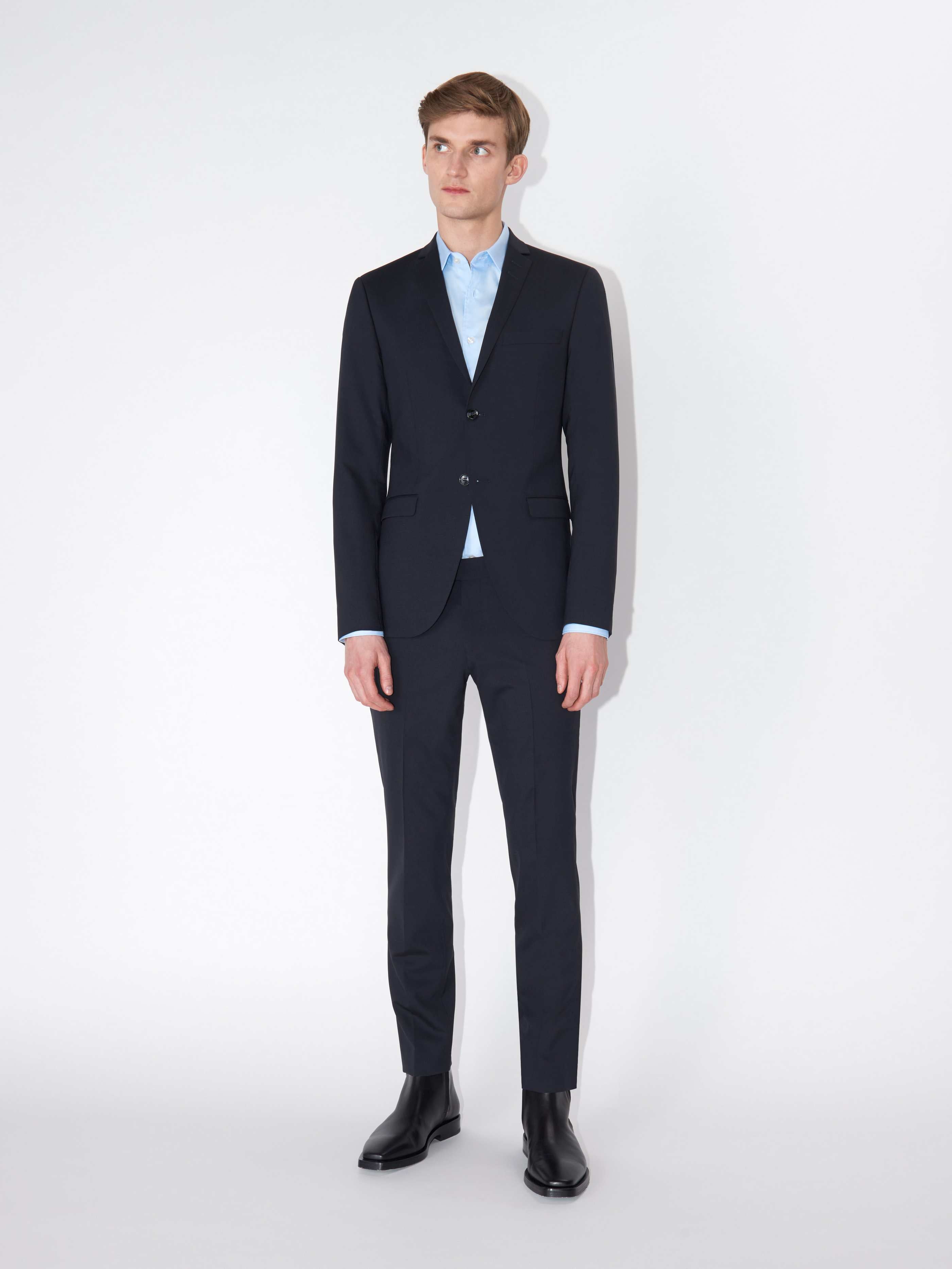 tiger-of-sweden-miesten-housut-tordon-angelico-slim-fit-tummansininen-2