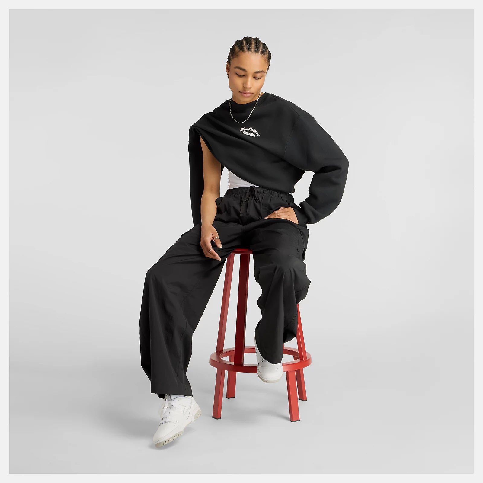 New Balance naisten reisitaskuhousut Woven Cargo Pant, musta