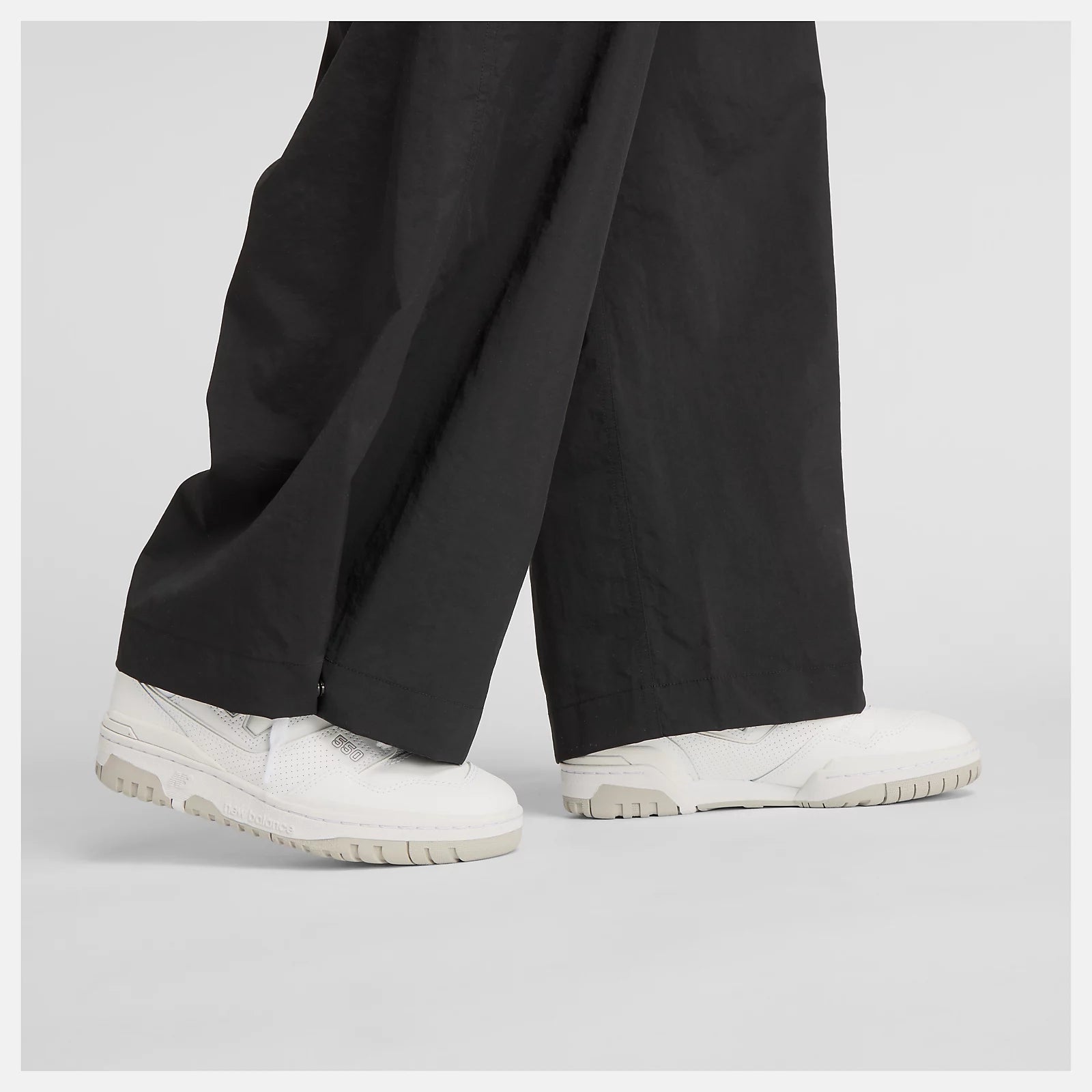 New Balance naisten reisitaskuhousut Woven Cargo Pant, musta