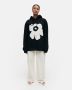 marimekko-huppari-runoja-unikko-placement-musta-1