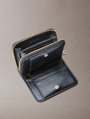 Calvin Klein Accessories naisten lompakko, CK PULLER MEDIUM FLAP ZIP Musta