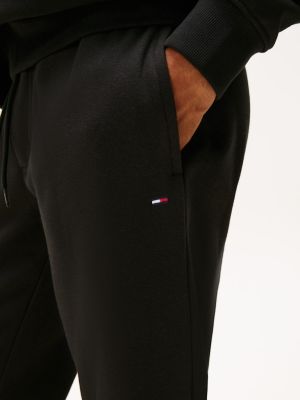 Tommy Jeans miesten collegehousut, TJM SLIM S FLAG SWEATPANT EXT Musta