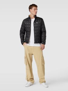 calvin-klein-jeans-miesten-lyhyt-untuvatakki-k-ultra-light-down-jacket-musta-1